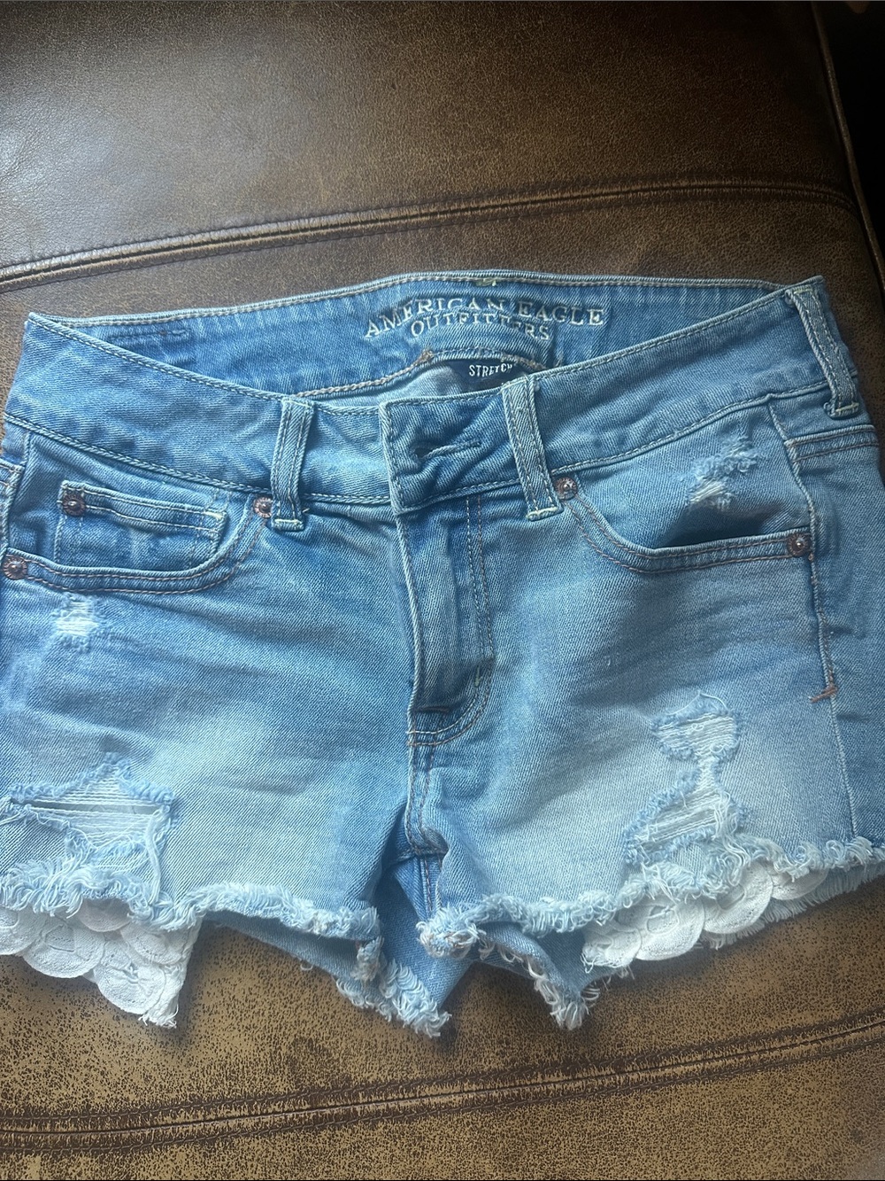American Eagle Light Blue Distressed Denim Shorts with Lace Trim